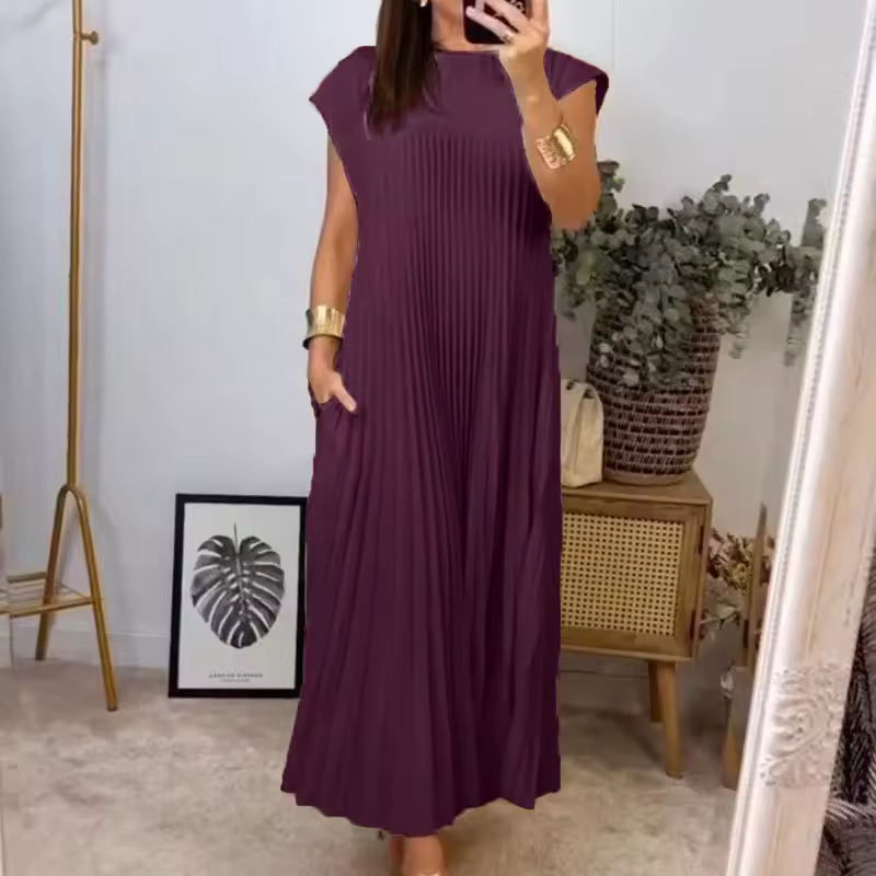 Vestido Aleksandra de Warszawska Elegancja, diseño clásico y cómodo, con detalles elegantes y tela suave en la imagen.