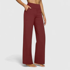 Pantalones cómodos Jasmynne de Warszawska Elegancja, en color neutro, con corte recto y tela suave visible en la imagen.
