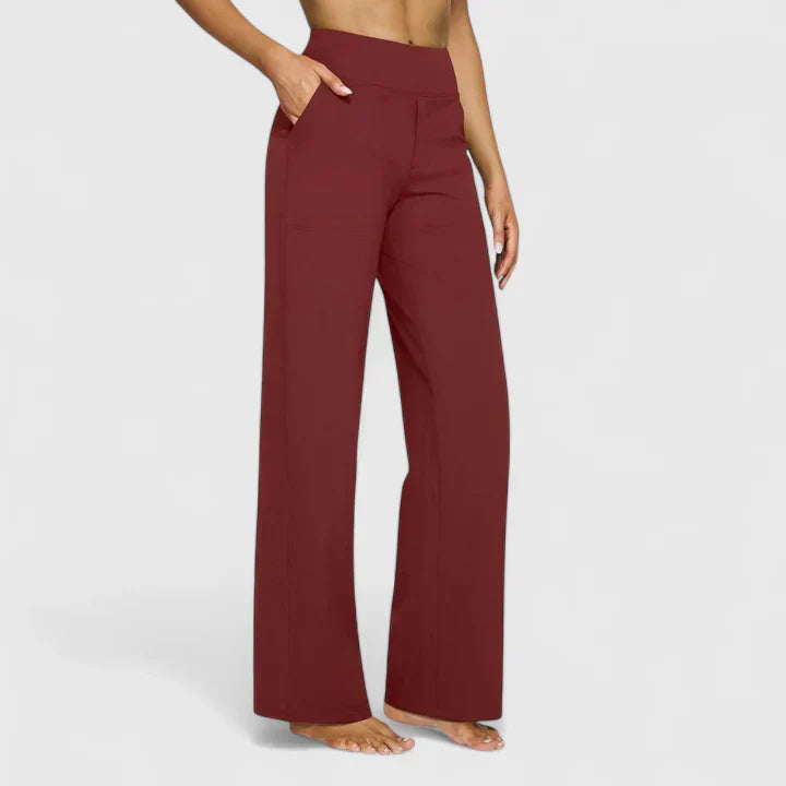 Pantalones elegantes Ame de Warszawska Elegancja, de corte clásico en tela de alta calidad, en color neutro.