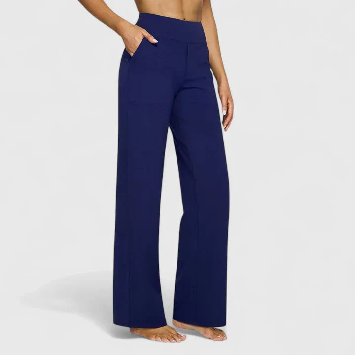 Pantalones cómodos Jasmynne de la marca Warszawska Elegancja, en color neutro, con diseño elegante y ajuste relajado.