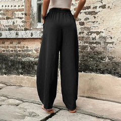Pantalones sueltos Vanna de Warszawska Elegancja en color neutro, con corte relajado y estilo moderno para mujer.
