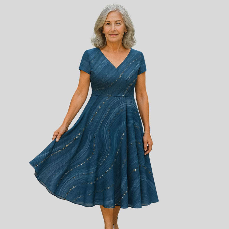 Vestido midi elegante Londyn de Warszawska Elegancja con escote en V, diseño sofisticado y ajustado en la parte superior.