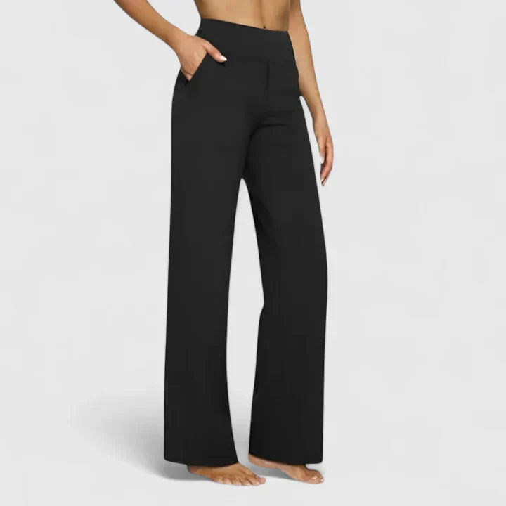 Pantalones elegantes Ame de Warszawska Elegancja, con corte clásico y acabado sofisticado, en color negro.