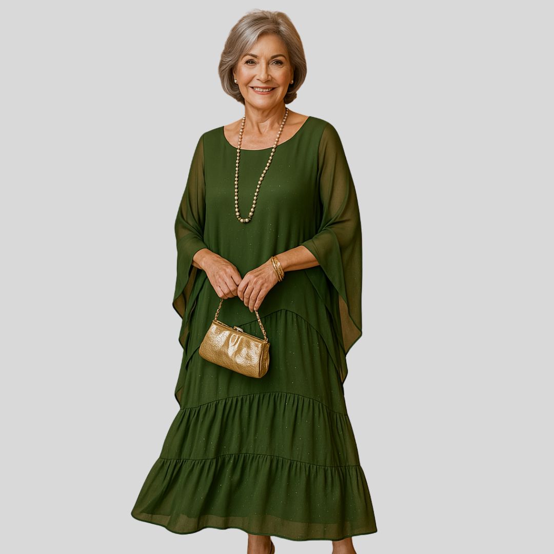 Vestido maxi elegante y transpirable de Warszawska Elegancja, con diseño fluido y detalles sofisticados para ocasiones especiales.