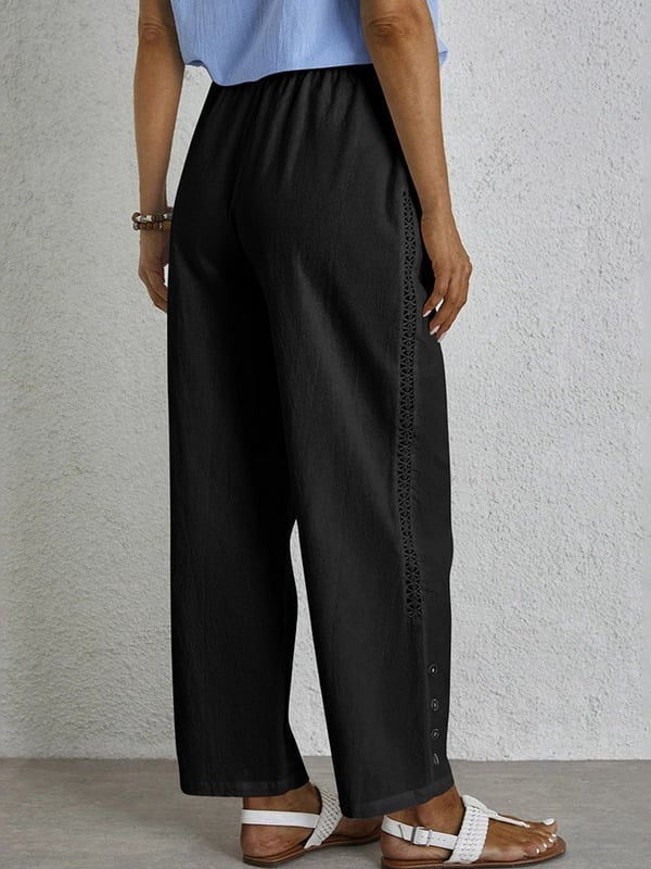 Pantalones relajados Shania de Warszawska Elegancja con botones, estilo casual y cómodo para looks modernos.