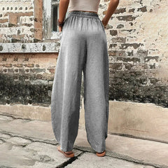 Pantalones sueltos Vanna de Warszawska Elegancja en color neutro, con corte cómodo y estilo casual elegante.