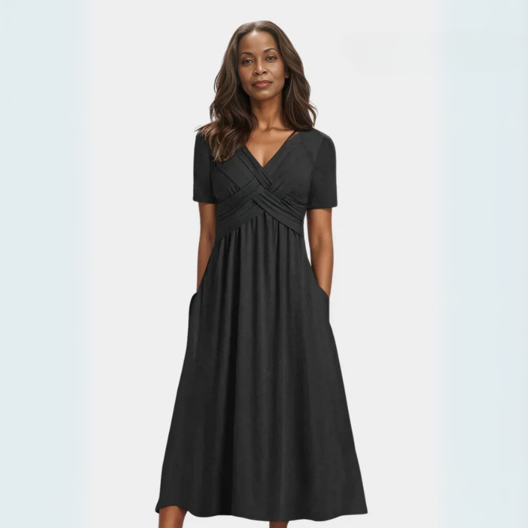 Vestido elegante Adéla de Warszawska Elegancja, diseño ajustado y sofisticado para ocasiones especiales.