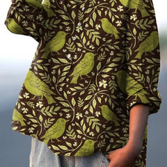 Camisa suelta y elegante Victoria de Warszawska Elegancja, con diseño casual y estilo sofisticado en color neutro.