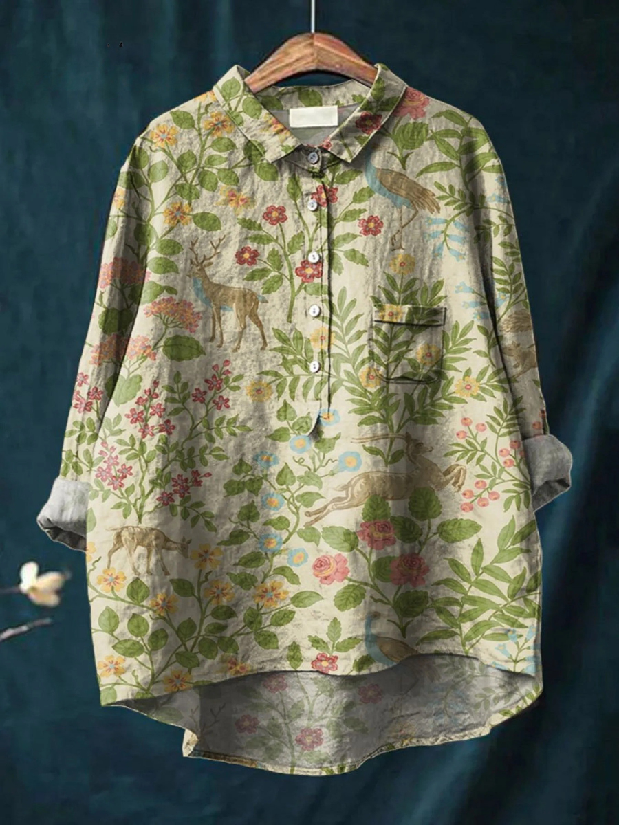 Camisa de mujer Géorgie Lekka con estampado floral, diseñada por Warszawska Elegancja, mostrando detalles de tela y corte.