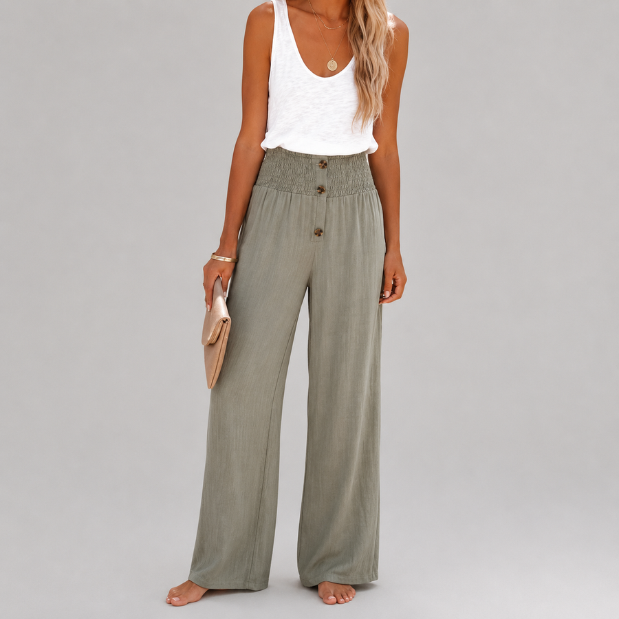 Pantalones relax de cintura alta Riana de Warszawska Elegancja, pantalones cómodos y modernos para mujer, en color negro.