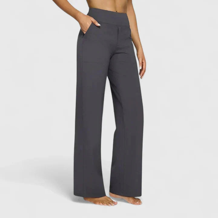 Pantalones elegantes Ame de Warszawska Elegancja, con corte clásico y tela de alta calidad, mostrados en la imagen.