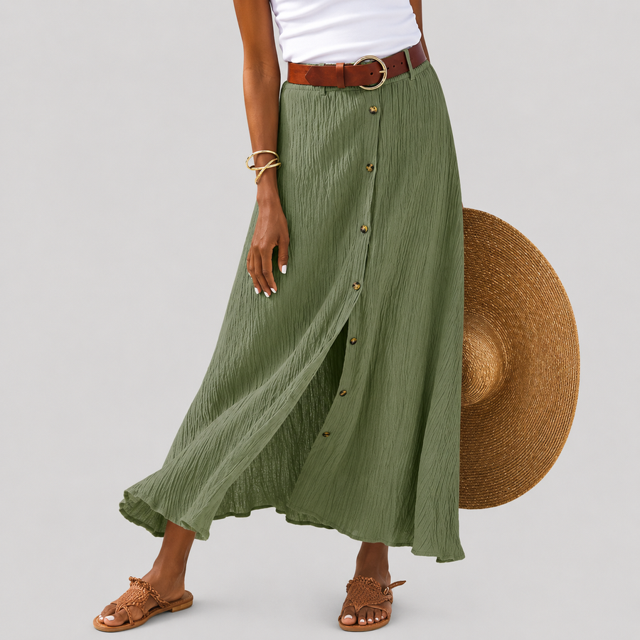 Falda voladora con botones de la marca Warszawska Elegancja, diseño elegante y fluido, ideal para looks modernos y sofisticados.