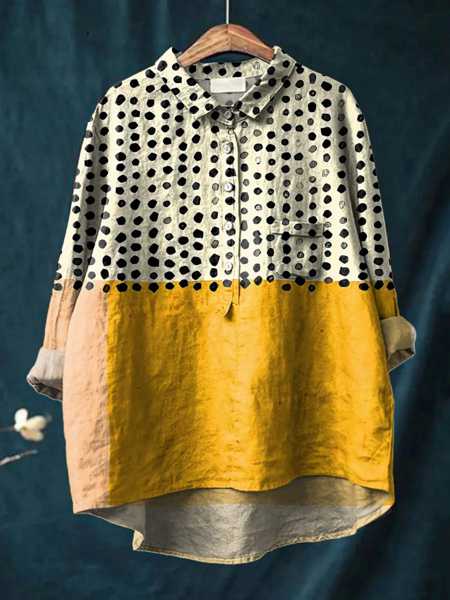 Camisa suelta Olivia de Warszawska Elegancja, estilo casual y elegante, en color claro, con cuello y mangas largas.