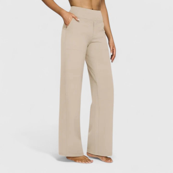 Pantalones sofisticados Hilary de Warszawska Elegancja en color neutro, estilo elegante y moderno, vista frontal.