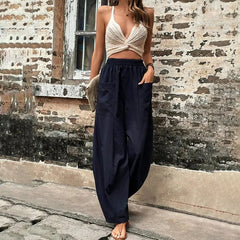 Pantalones sueltos Vanna de Warszawska Elegancja, en color neutro, con corte cómodo y estilo casual.