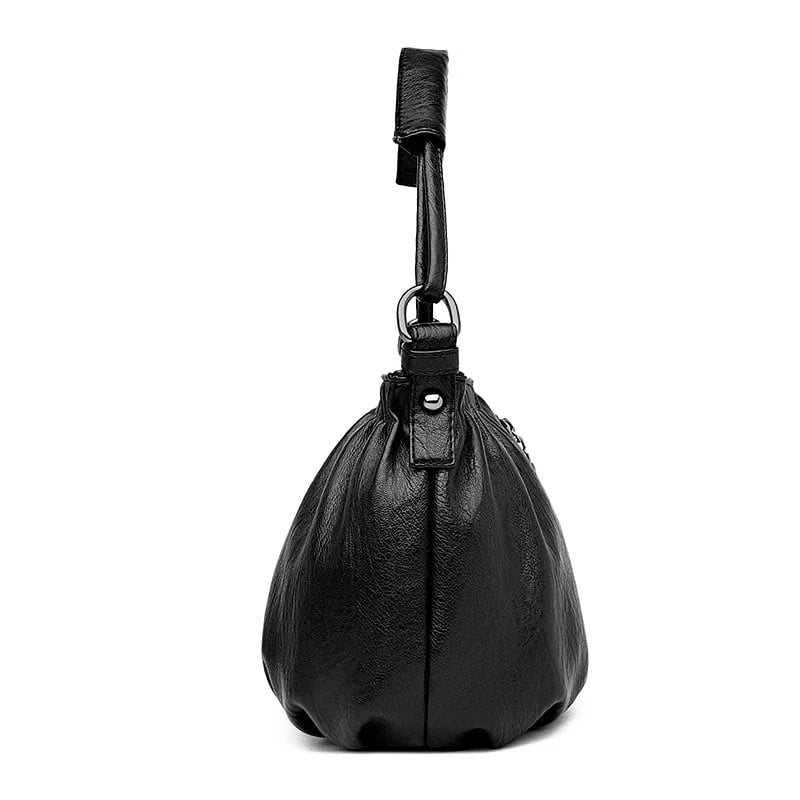 Bolso moderno Katarzyna de Warszawska Elegancja, torebka multifuncional con varias capas en estilo contemporáneo.