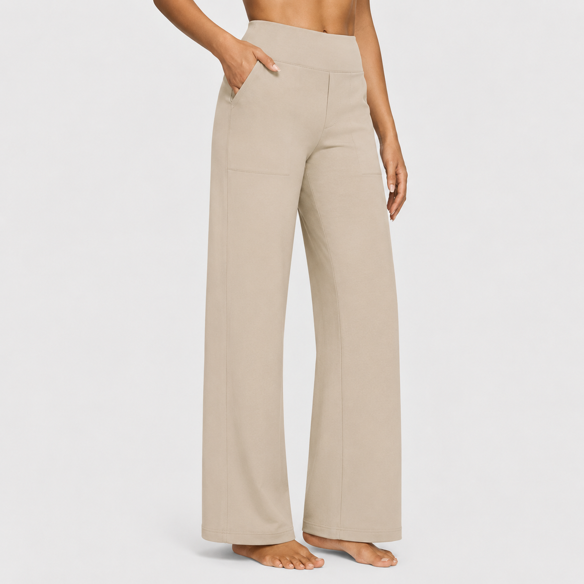 Pantalones cómodos Jasmynne de Warszawska Elegancja en color neutro, ideales para un estilo casual y elegante.