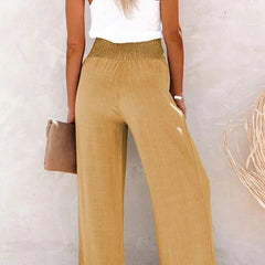 Pantalones relax de la marca Warszawska Elegancja, estilo casual con tiro alto y corte cómodo, en color neutro.