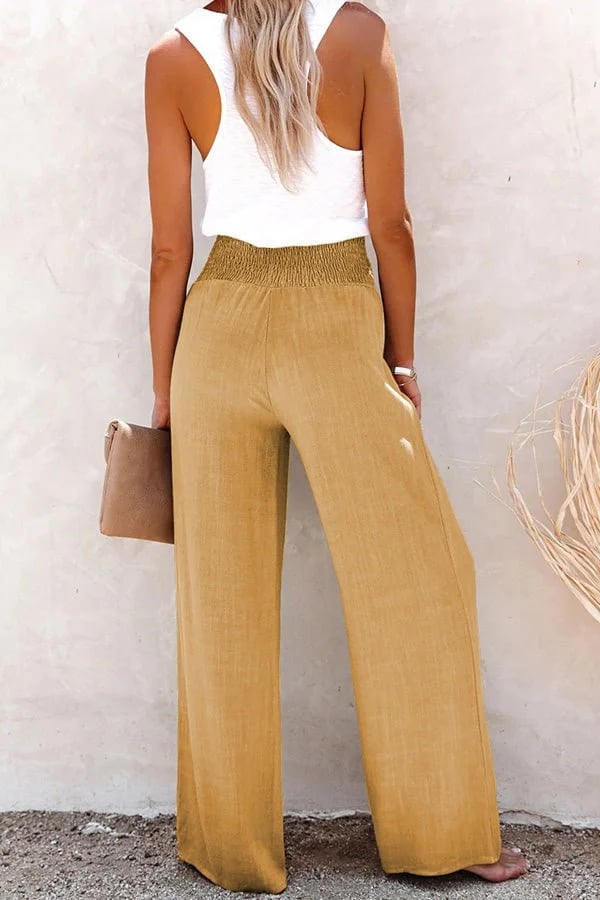Pantalones relax de la marca Warszawska Elegancja, estilo casual con tiro alto y corte cómodo, en color neutro.