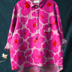 Camisa casual Mia de Kwiatowa Warszawska Elegancja, con estampado floral y cuello clásico, en tela ligera y cómoda.