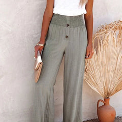 Pantalones relajados Riana de Warszawska Elegancja con cintura alta, en color neutro, vista frontal en tela cómoda y moderna.