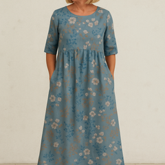 Vestido cómodo Teresa de Warszawska Elegancja, estilo clásico y sofisticado, mostrado en color y tejido elegante.