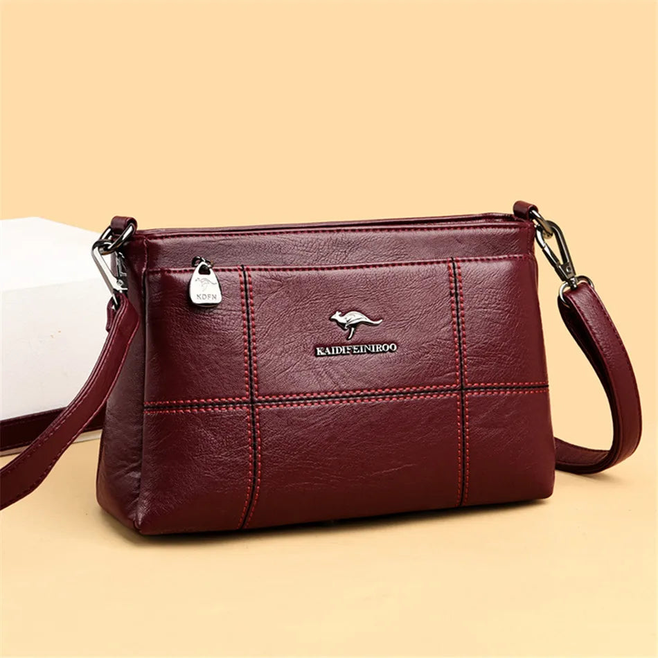 Bolso de hombro Joanna de Warszawska Elegancja, con compartimentos y diseño elegante, en tonos neutros.