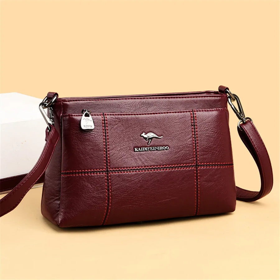 Bolso de hombro Joanna de Warszawska Elegancja, con compartimentos y diseño elegante, en tonos neutros.