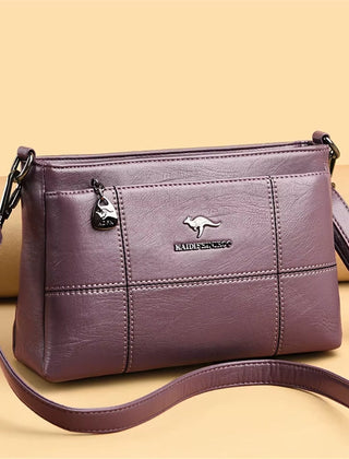 Bolso bandolera Joanna de Warszawska Elegancja con compartimentos y diseño elegante, visible en la imagen.