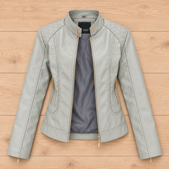 Chaqueta de cuero femenina en color verde claro, estilo plano, de la marca Warszawska Elegancja, vista desde arriba.