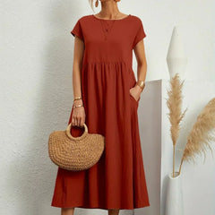 Vestido Irena de Warszawska Elegancja, ligero y femenino, con diseño elegante y cómodo para lucir con estilo.