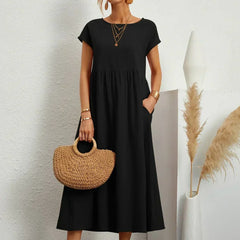 Vestido Irena de Warszawska Elegancja, diseño ligero y femenino, con detalles elegantes y corte favorecedor para mujer.