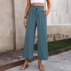 Pantalones lounge Eluna de Warszawska Elegancja en color gris, cómodos y relajados para uso casual y de ocio.