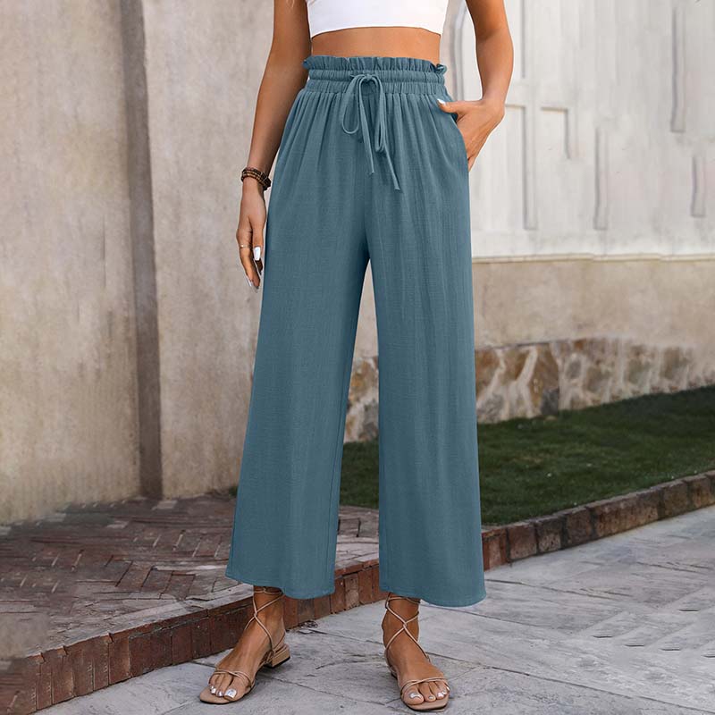 Pantalones lounge Eluna de Warszawska Elegancja en color gris, cómodos y relajados para uso casual y de ocio.