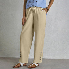 Pantalones relajados Shania de Warszawska Elegancja con botones, vista frontal de los pantalones en color neutro.