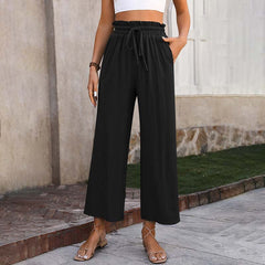 Pantalones lounge Eluna de Warszawska Elegancja en color gris, con diseño cómodo y moderno, ideales para estar en casa o relajarse.