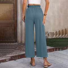 Pantalones lounge Eluna de Warszawska Elegancja en color gris, estilo cómodo y moderno para relajarse.