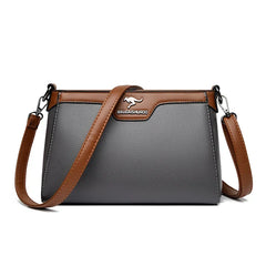 Bolso bandolera Olga de Warszawska Elegancja, cruzada, en cuero con detalles elegantes y asa ajustable.