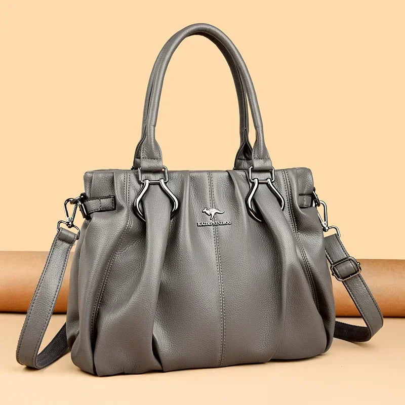 Bolsa cruzada urbana Lucyna de Warszawska Elegancja en color neutro, con asa ajustable y diseño elegante para uso diario.