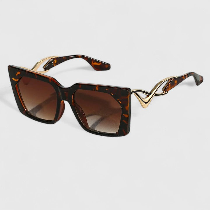 Gafas de sol elegantes Oaklynne de Warszawska Elegancja con montura de acetato y lentes oscuras en estilo sofisticado