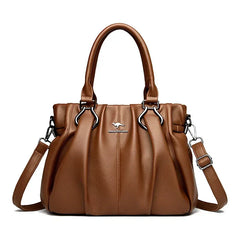 Bolsa cruzada Lucyna de Warszawska Elegancja, en color neutro, con correa ajustable y diseño elegante para uso diario.