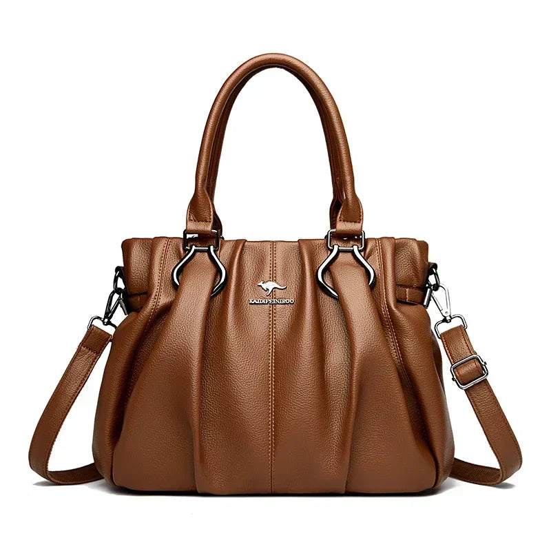 Bolsa cruzada Lucyna de Warszawska Elegancja, en color neutro, con correa ajustable y diseño elegante para uso diario.
