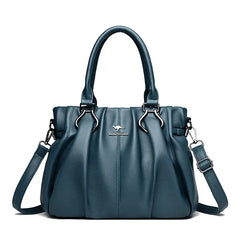 Bolsa cruzada Lucyna de Warszawska Elegancja, tamaño compacto y diseño elegante para uso diario, en color gris.