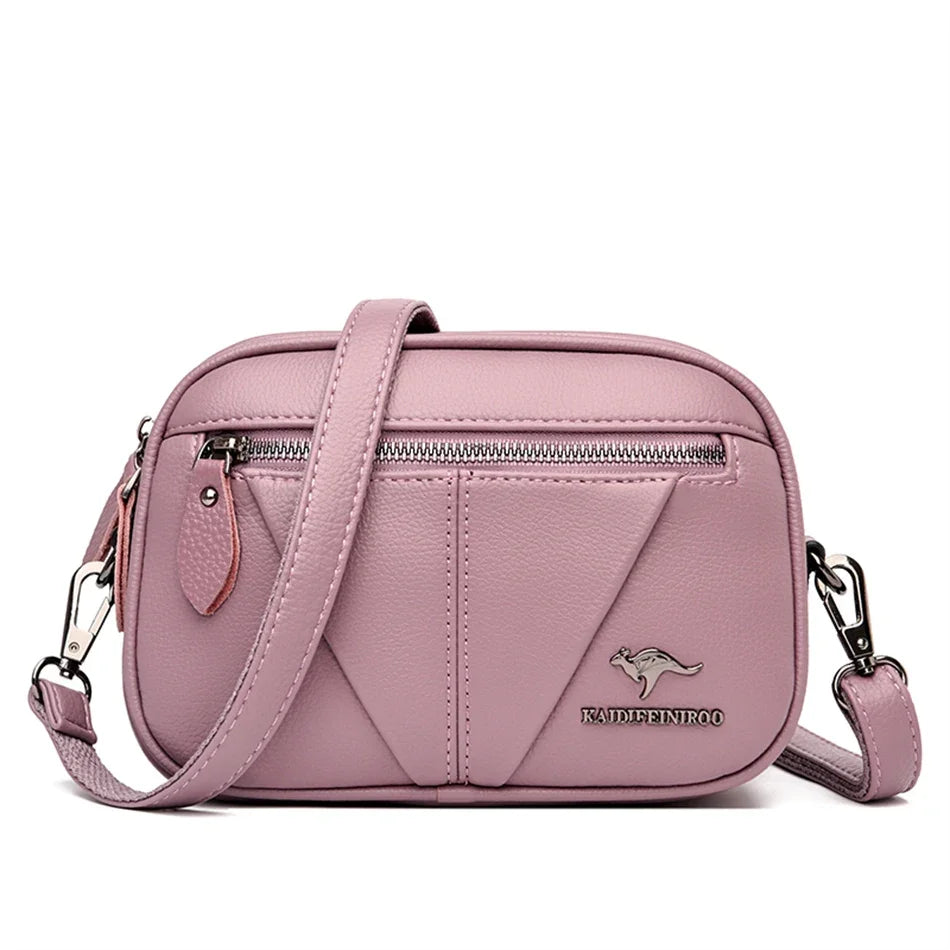 Bolsa compacta de cuero Kamila de Warszawska Elegancja, vista de frente mostrando detalles y textura de la piel.