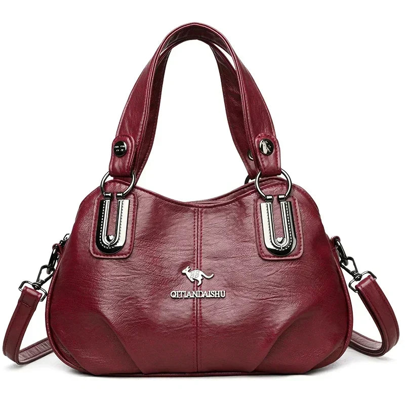 Lidia, gran bolso de diseñador de Warszawska Elegancja, con asas y detalles elegantes, en color negro.