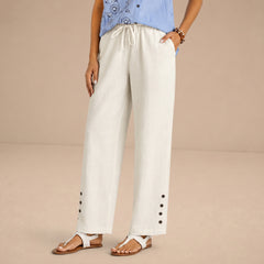 Pantalones relajados Shania de Warszawska Elegancja con botones, estilo casual y cómodo, en color neutro.