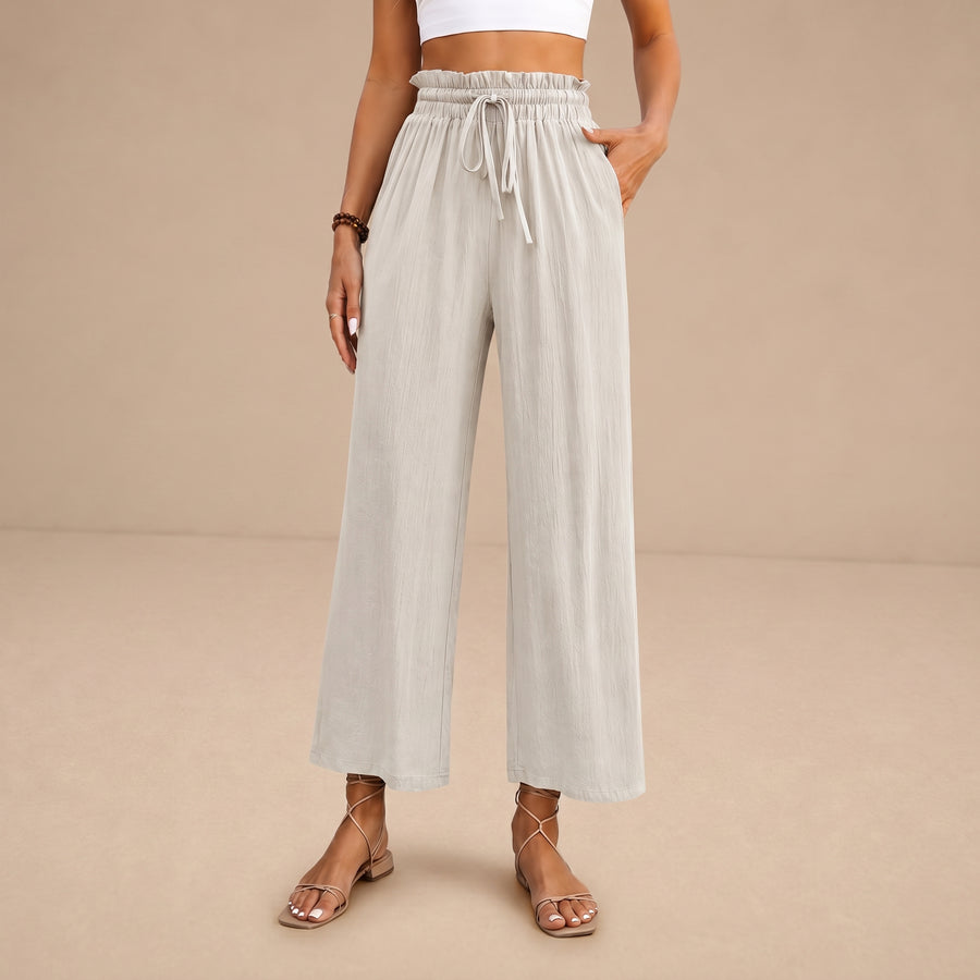 Pantalones lounge Eluna de Lekkie, marca Warszawska Elegancja, en color gris, con diseño cómodo y moderno para uso casual.