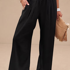 Pantalones anchos Aileen de Warszawska Elegancja, ropa de playa cómoda y moderna, en color blanco con cintura elevada.