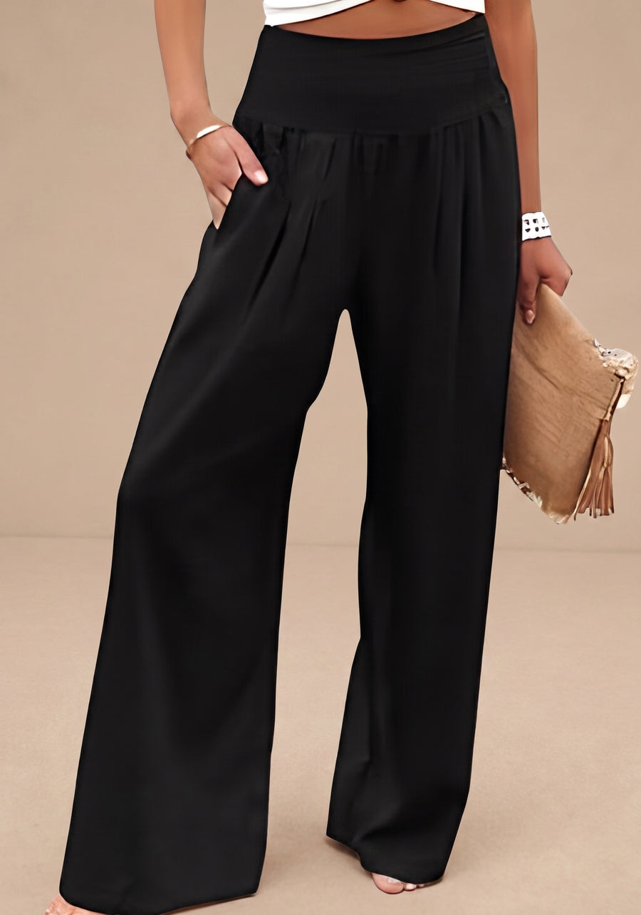 Pantalones anchos Aileen de Warszawska Elegancja, ropa de playa cómoda y moderna, en color blanco con cintura elevada.