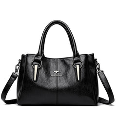 Bolso bandolera de cuero suave Lena de Warszawska Elegancja, con diseño compacto y elegante en color neutro.
